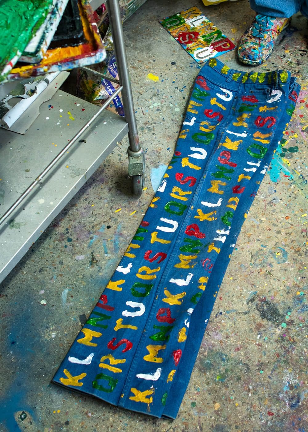 Detail of hand-painted vintage clothing by Jesse Grylls